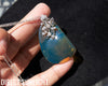 Blue Amber Dominican Pendant Necklace with 925 Silver Flowers