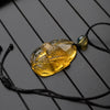 Dominican Blue Amber Pendant, Bird Carved