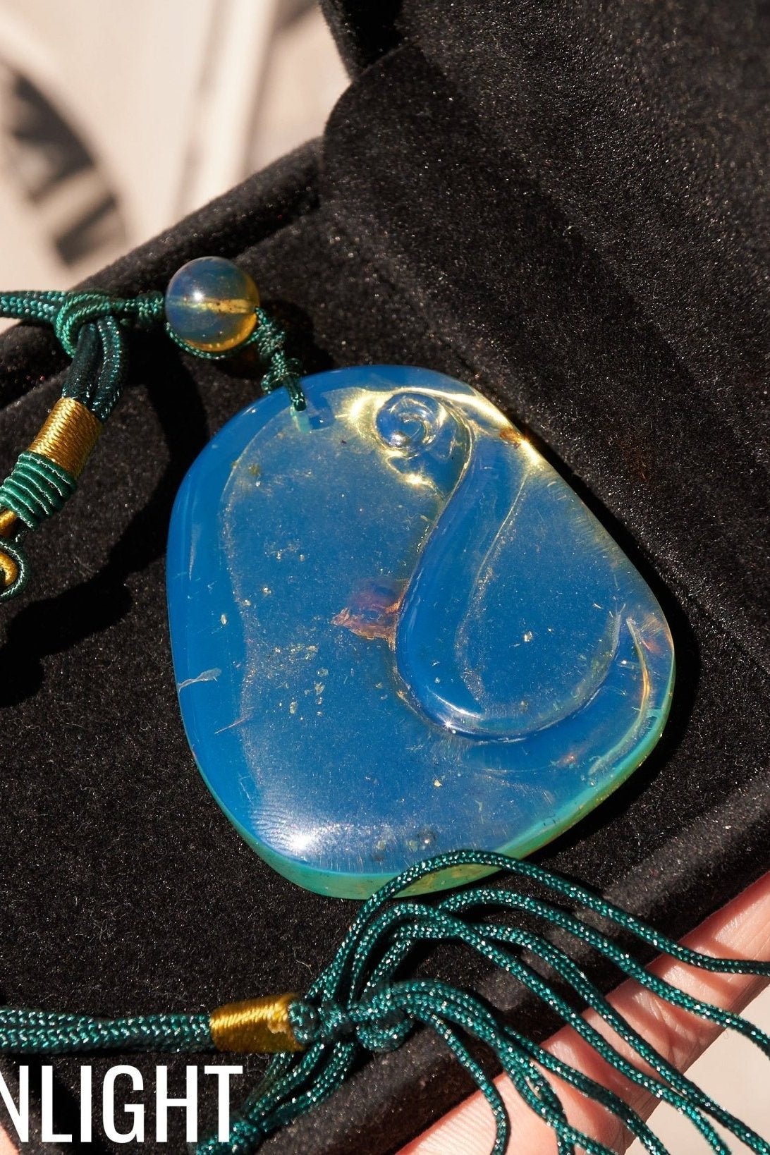 Blue Amber Dominican Pendant Necklace Bell carving shape. - Larimar Creations