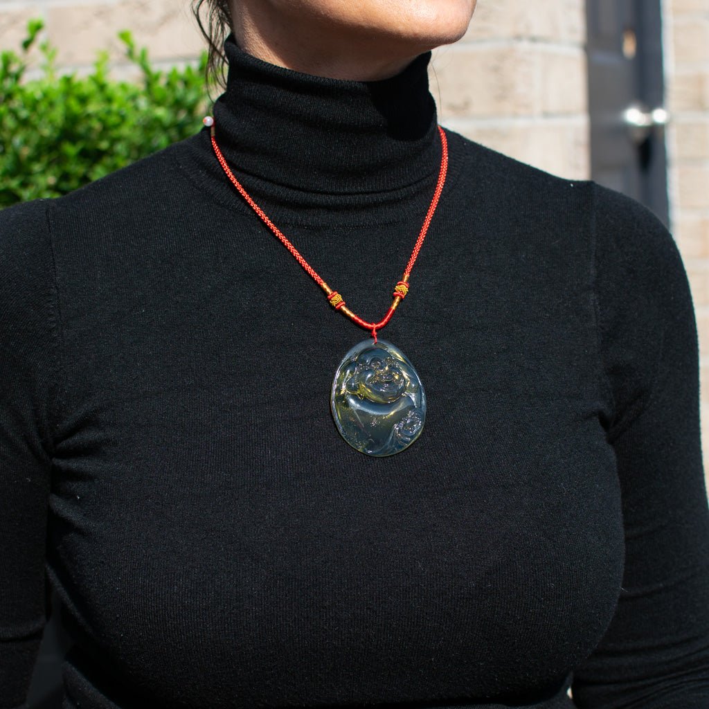 Dominican Blue Amber Buddha Pendant