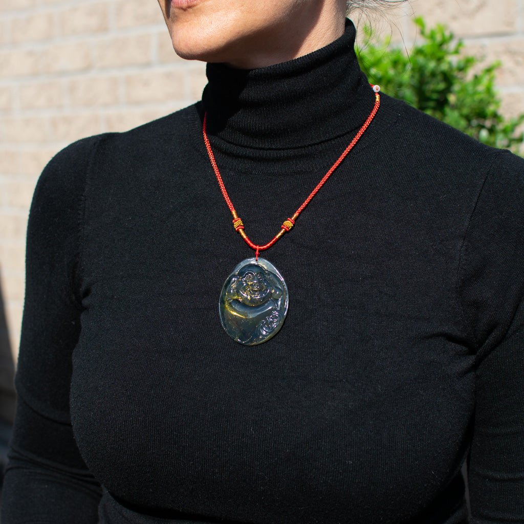 Dominican Blue Amber Buddha Pendant