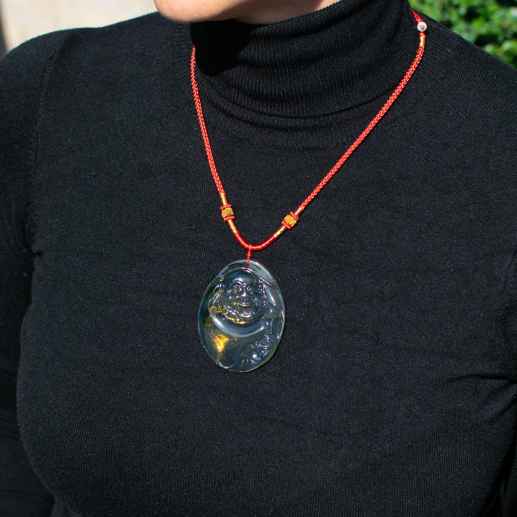 Dominican Blue Amber Buddha Pendant