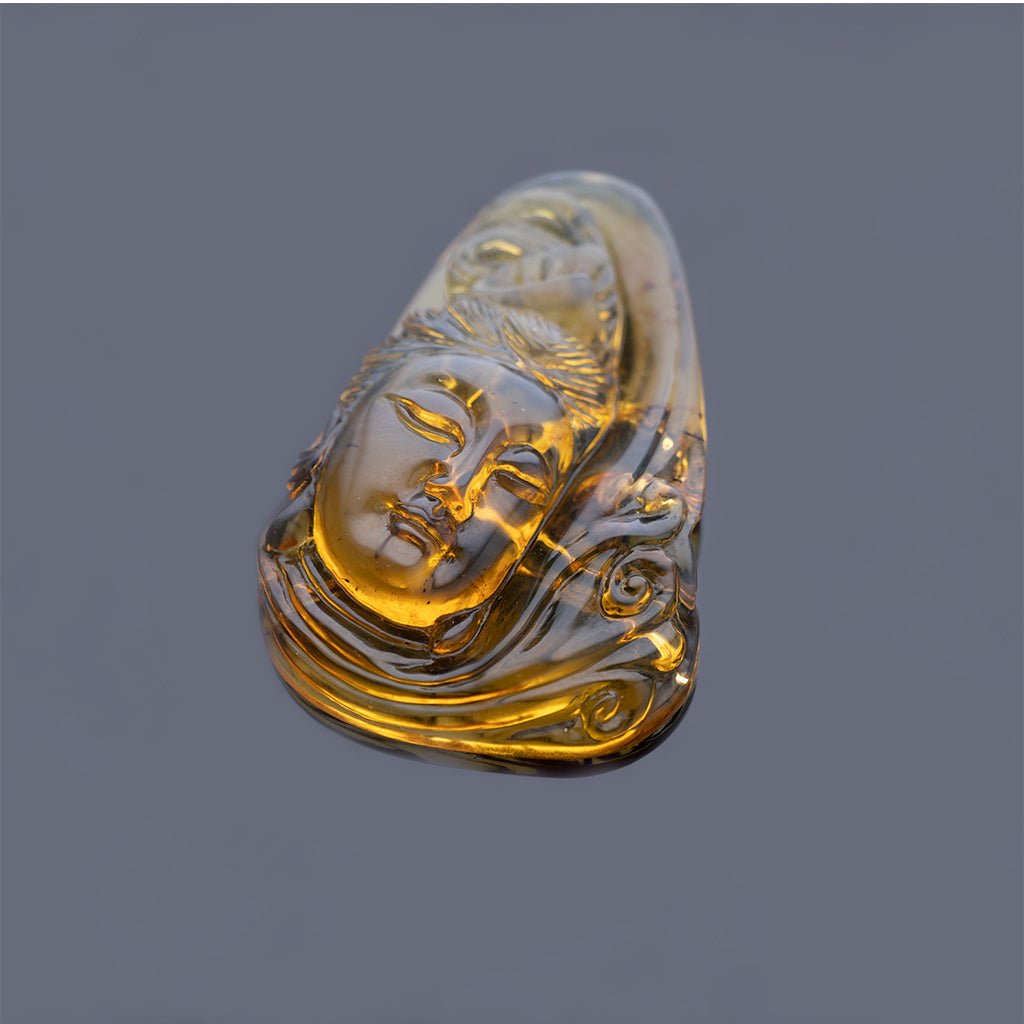 Dominican Blue Amber Guan Yin Pendant - Larimar Creations