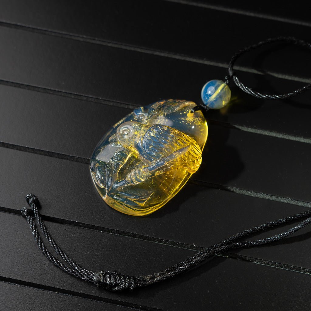 Dominican Blue Amber Pendant, Bird Carved - Larimar Creations