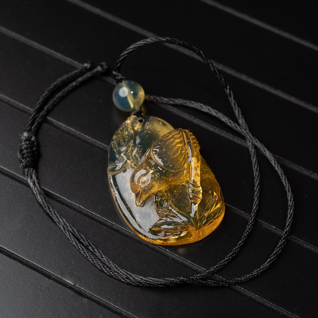 Dominican Blue Amber Pendant, Bird Carved - Larimar Creations