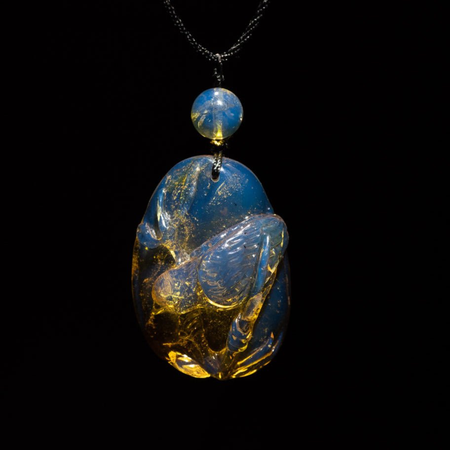 Dominican Blue Amber Pendant, Bird Carved - Larimar Creations