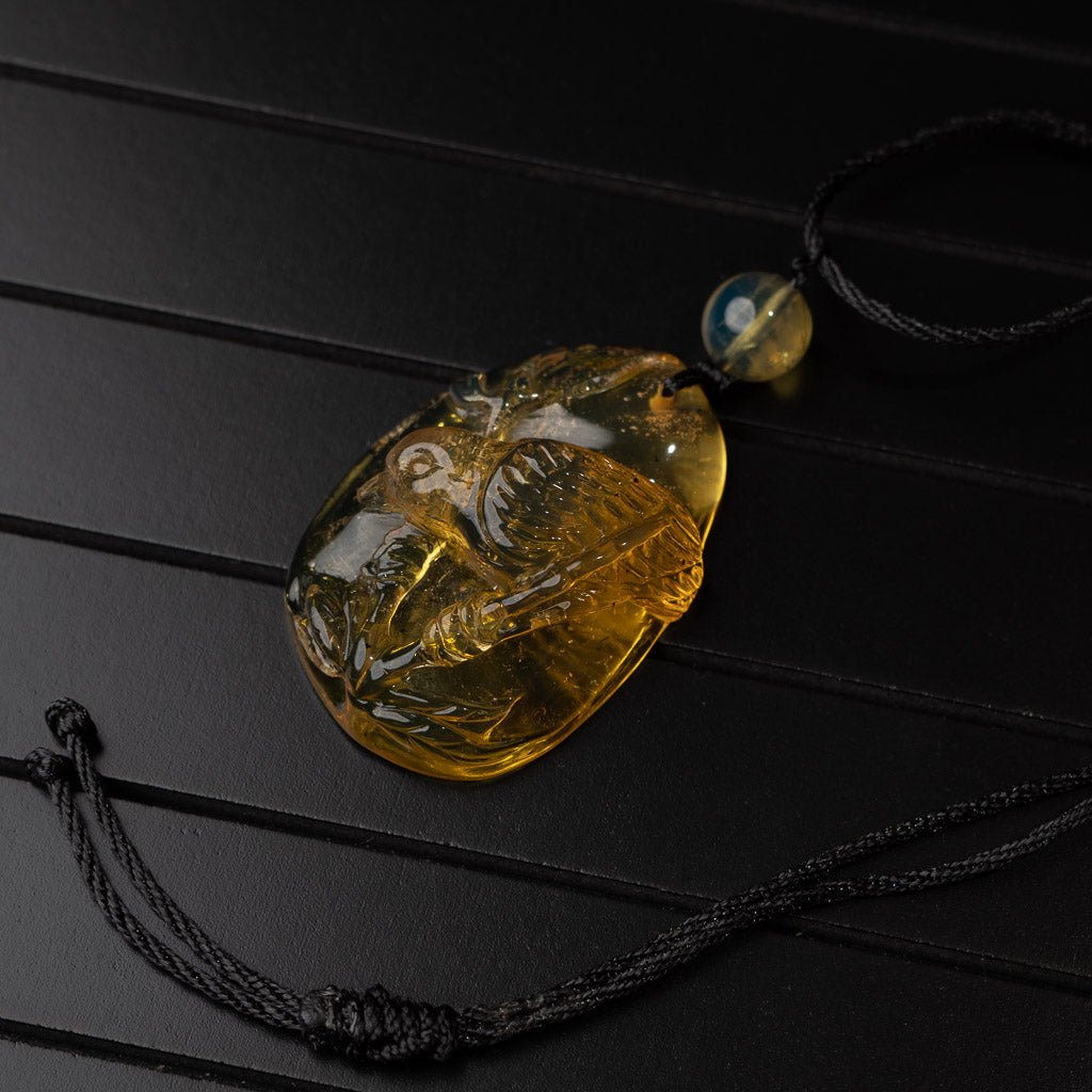 Dominican Blue Amber Pendant, Bird Carved - Larimar Creations