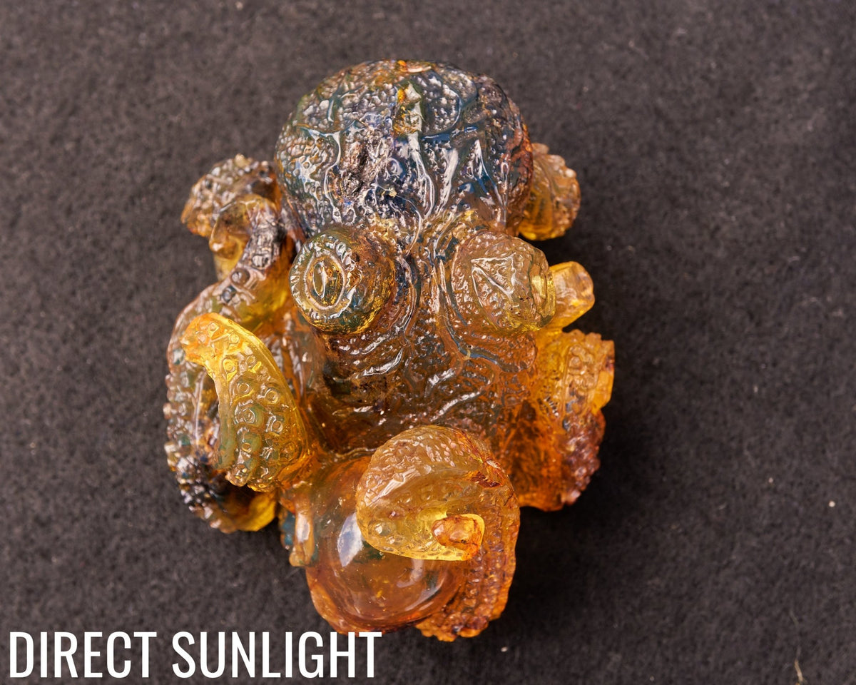 Octopus and Skull Carving Green Amber Dominican - Larimar Creations