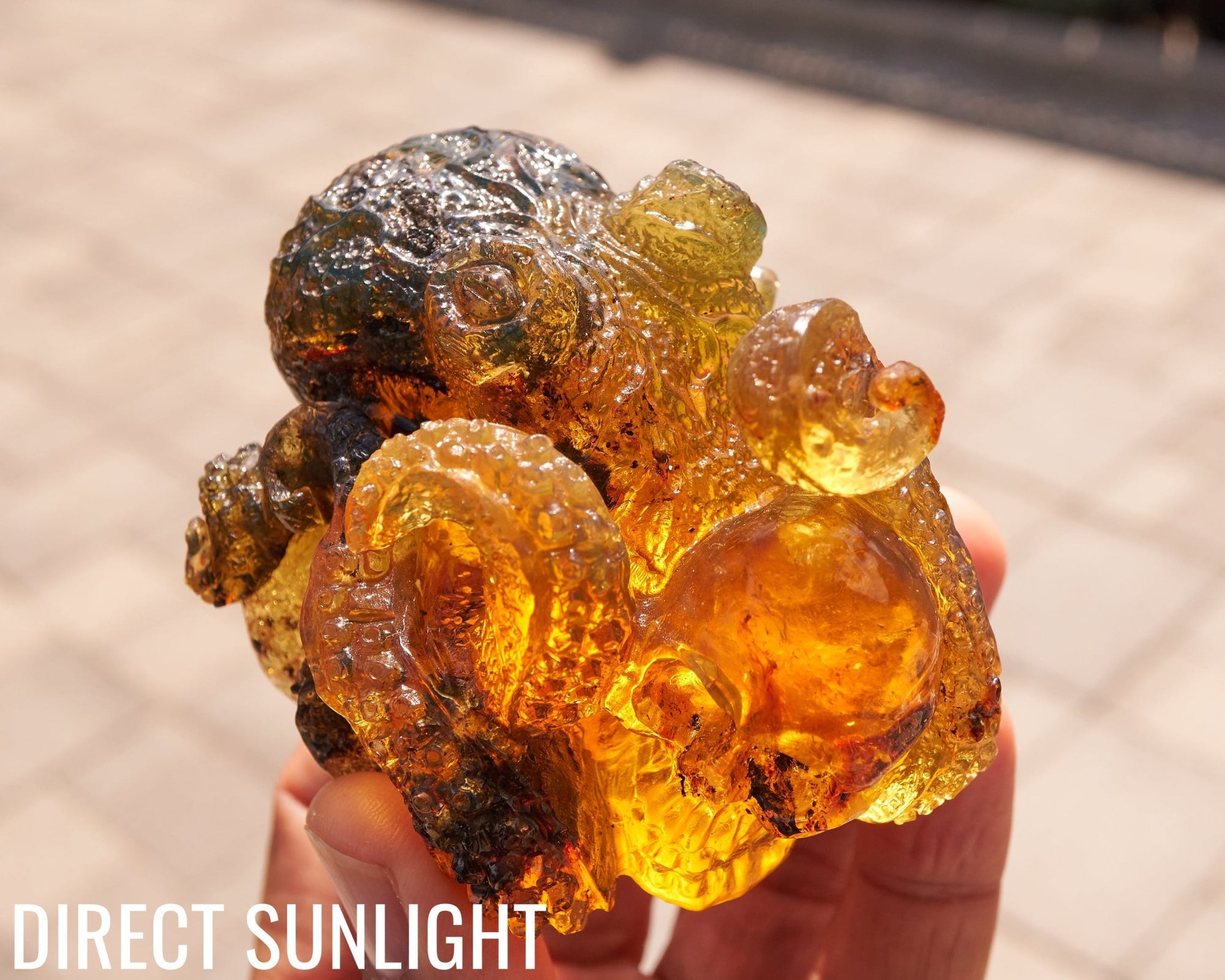 Octopus and Skull Carving Green Amber Dominican - Larimar Creations