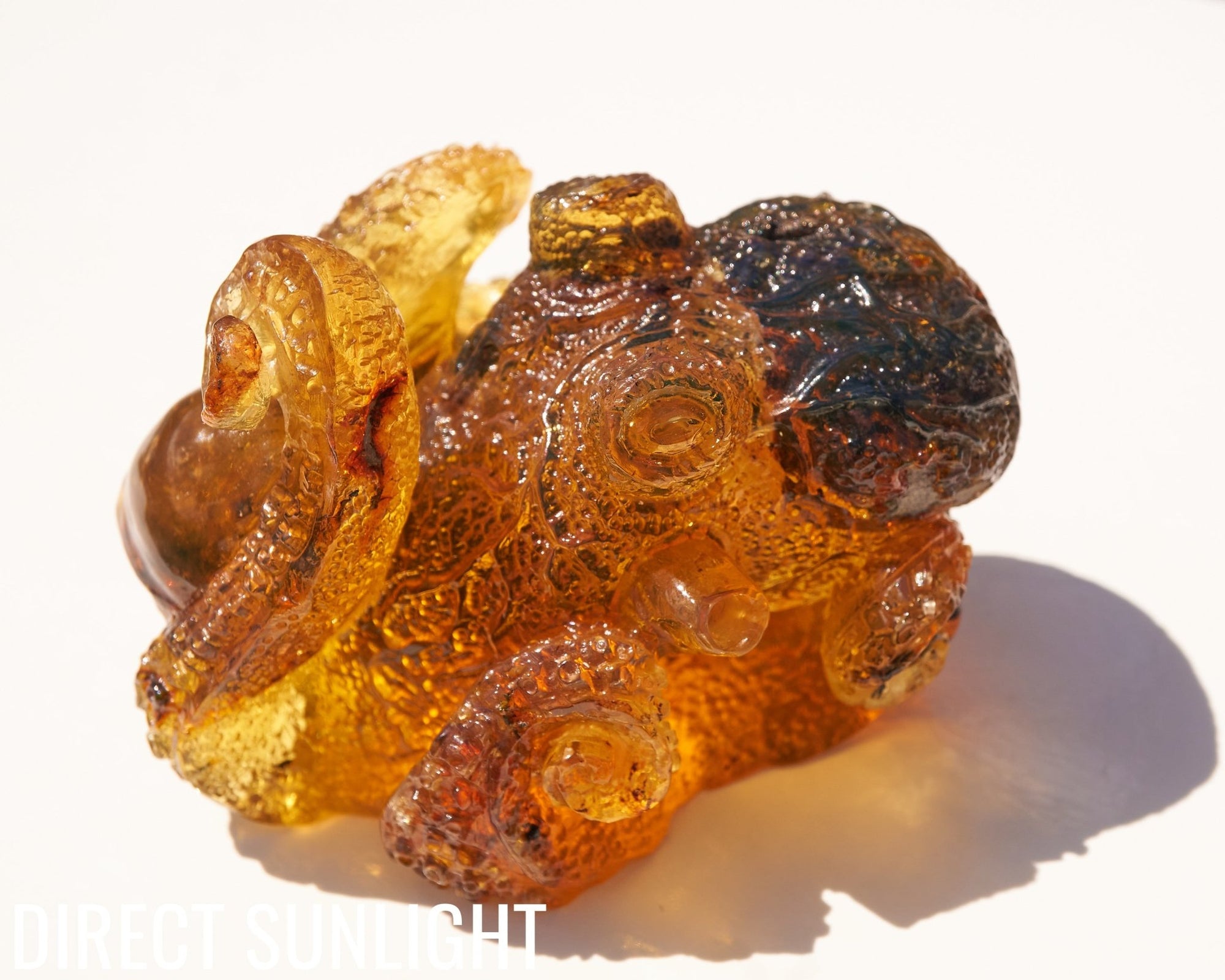 Octopus and Skull Carving Green Amber Dominican - Larimar Creations