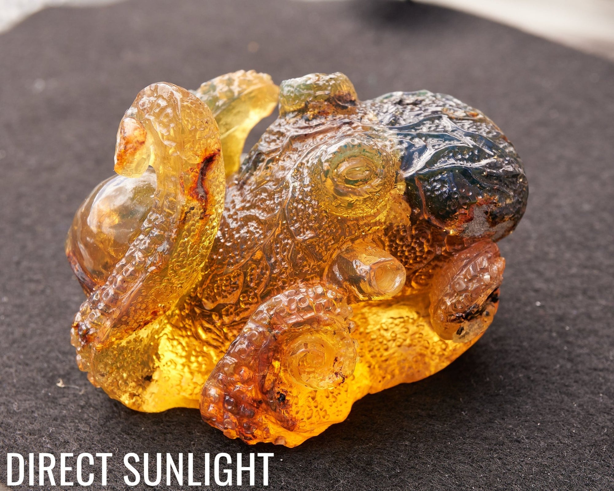 Octopus and Skull Carving Green Amber Dominican