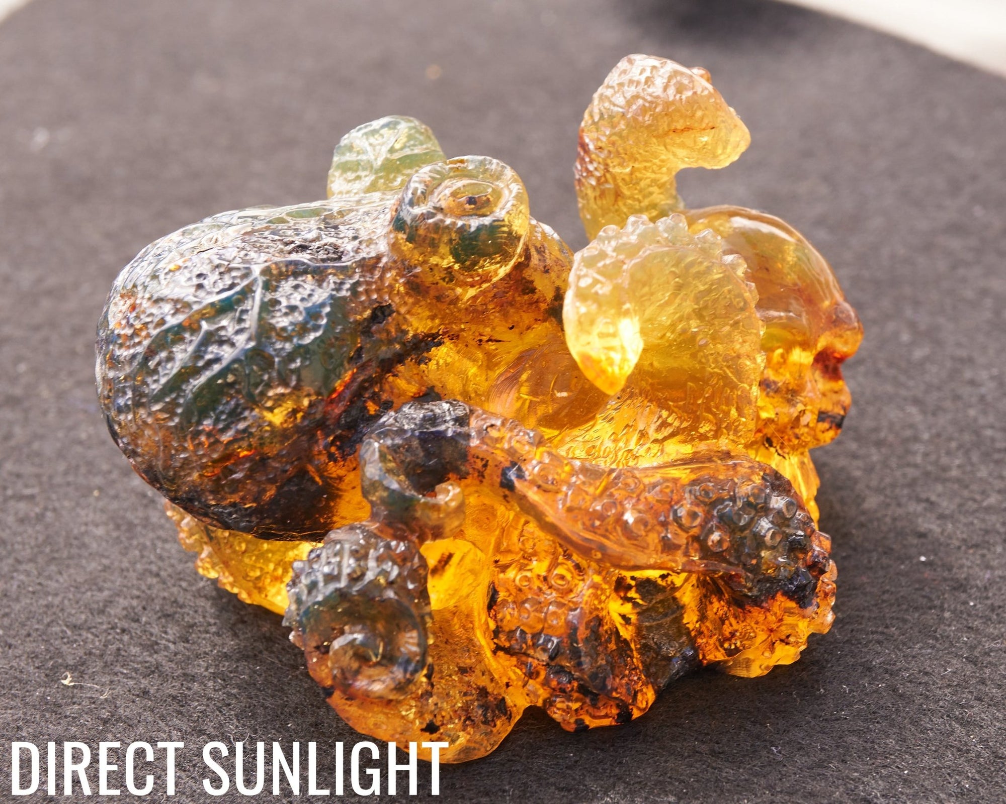 Octopus and Skull Carving Green Amber Dominican - Larimar Creations