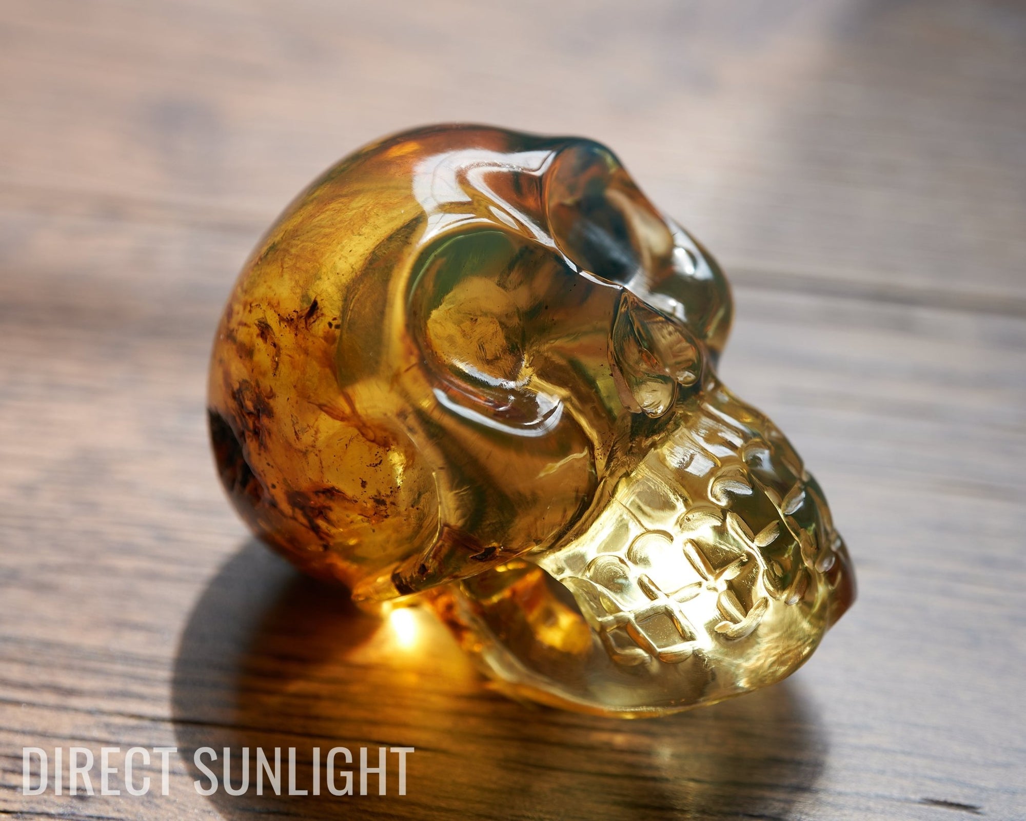Blue amber skull carving